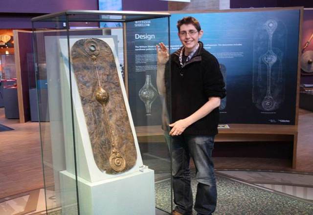 The Collection Access Officer, Antony Lee, with the Witham Shield.