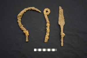 Some of the ironwork – left to right a reaping hook, a cauldron suspension hook and a spear head
