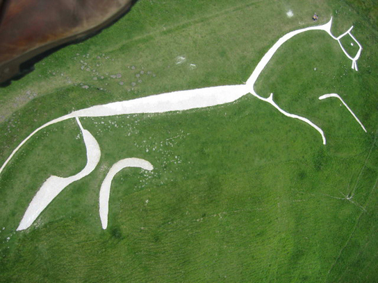 Aerial view from a paramotor of the White Horse at Uffington. Photo by Dave Price and licensed for reuse under this Creative Commons licence.